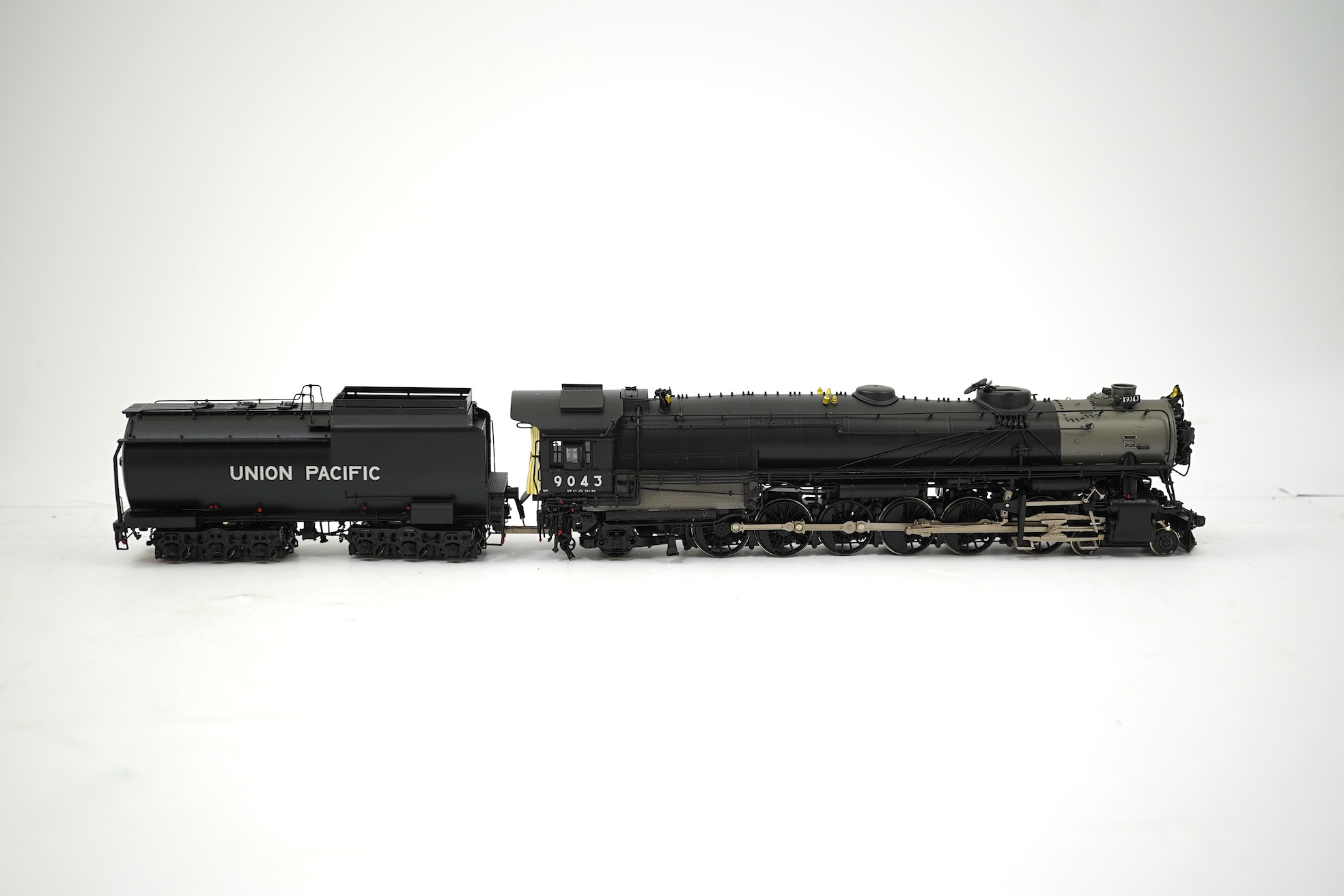 A boxed HO gauge Key Imports model of Union Pacific 9000 class, 9043, 4-12-2 tender locomotive, powered for two rail operation.